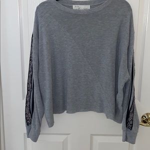 Grey Sweater with Black Design on Sleeves